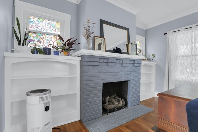 207 Jefferson Rd, Newark, OH 43055 - living room featuring a brick fireplace, ornamental molding, and wood finished floors