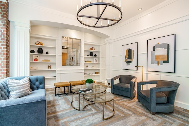 251 Daniel Burnham Sq Unit 703, Columbus, OH 43215 - living area featuring a chandelier, ornamental molding, ornate columns, and baseboards