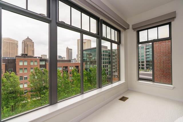 251 Daniel Burnham Sq Unit 703, Columbus, OH 43215 - unfurnished sunroom featuring a city view