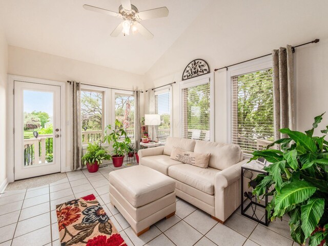 8171 Campden Lakes Blvd, Dublin, OH 43016 - living room featuring healthy amount of natural light, light tile patterned floors, a ceiling fan, and high vaulted ceiling