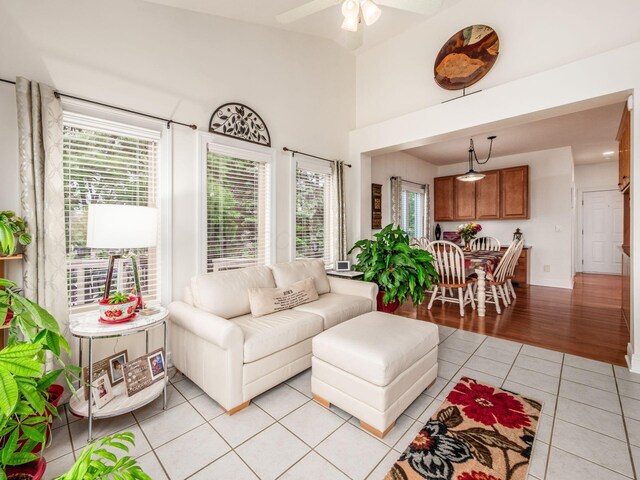 8171 Campden Lakes Blvd, Dublin, OH 43016 - living room with light tile patterned floors and ceiling fan