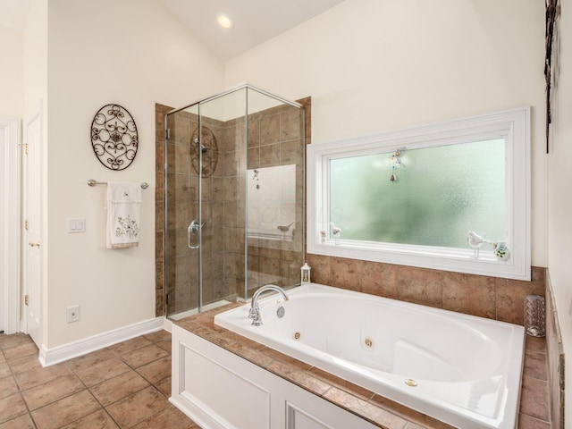 8171 Campden Lakes Blvd, Dublin, OH 43016 - bathroom featuring a jetted tub, a shower stall, tile patterned floors, and baseboards