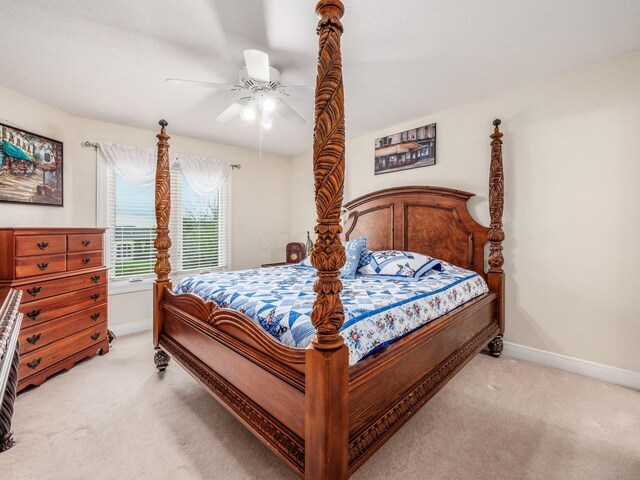 8171 Campden Lakes Blvd, Dublin, OH 43016 - bedroom with light colored carpet, baseboards, and a ceiling fan