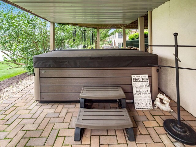 8171 Campden Lakes Blvd, Dublin, OH 43016 - view of patio / terrace with a hot tub