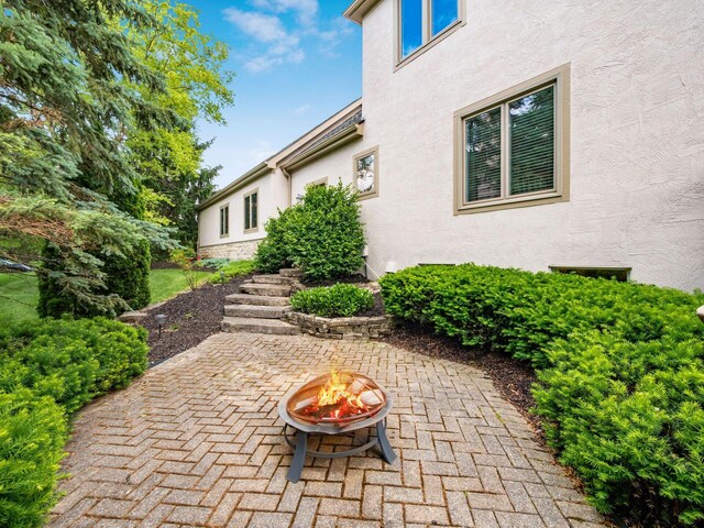 8171 Campden Lakes Blvd, Dublin, OH 43016 - view of patio with a fire pit