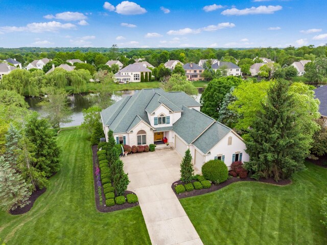 8171 Campden Lakes Blvd, Dublin, OH 43016 - aerial perspective of suburban area with a nearby body of water and a tree filled landscape