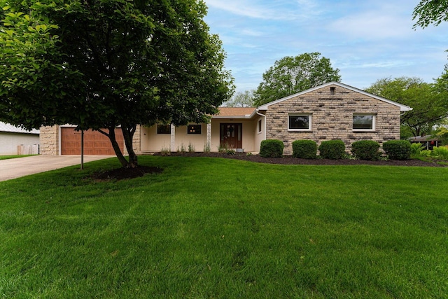 4015 Mountview Rd, Upper Arlington, OH 43220 - ranch-style house featuring stone siding, concrete driveway, and a front yard
