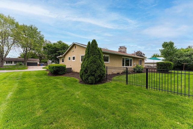 4015 Mountview Rd, Upper Arlington, OH 43220 - view of home's exterior featuring a chimney, central air condition unit, and stucco siding