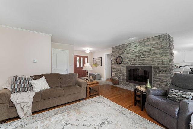 4015 Mountview Rd, Upper Arlington, OH 43220 - living area with light wood-style flooring, a fireplace, and crown molding