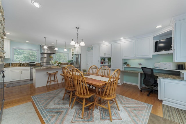 4015 Mountview Rd, Upper Arlington, OH 43220 - dining space with light wood-style flooring, recessed lighting, and a chandelier