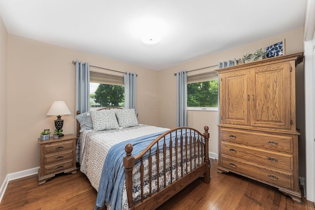 4015 Mountview Rd, Upper Arlington, OH 43220 - bedroom featuring multiple windows, baseboards, and dark wood-style floors