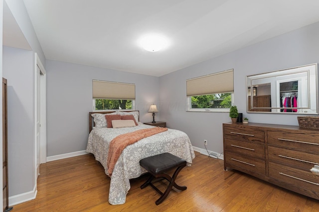 4015 Mountview Rd, Upper Arlington, OH 43220 - bedroom with light wood-style flooring, multiple windows, and baseboards