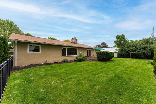 4015 Mountview Rd, Upper Arlington, OH 43220 - back of house with stucco siding and a chimney