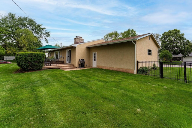 4015 Mountview Rd, Upper Arlington, OH 43220 - rear view of property with stucco siding, a chimney, and a patio area
