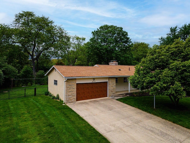4015 Mountview Rd, Upper Arlington, OH 43220 - ranch-style home with stone siding, a garage, driveway, and stucco siding