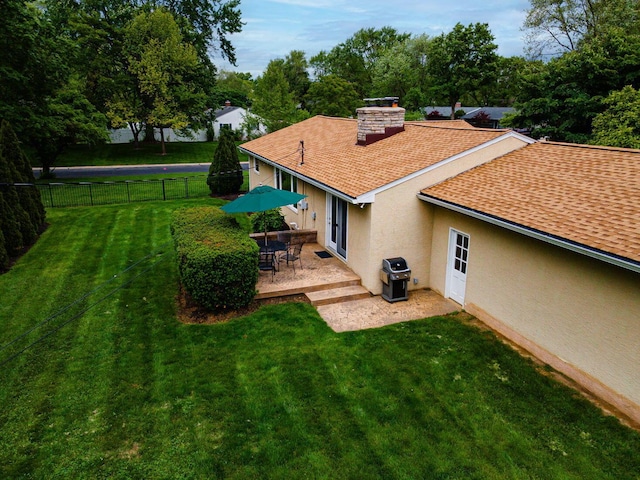 4015 Mountview Rd, Upper Arlington, OH 43220 - rear view of house featuring stucco siding, a shingled roof, a chimney, and a patio area