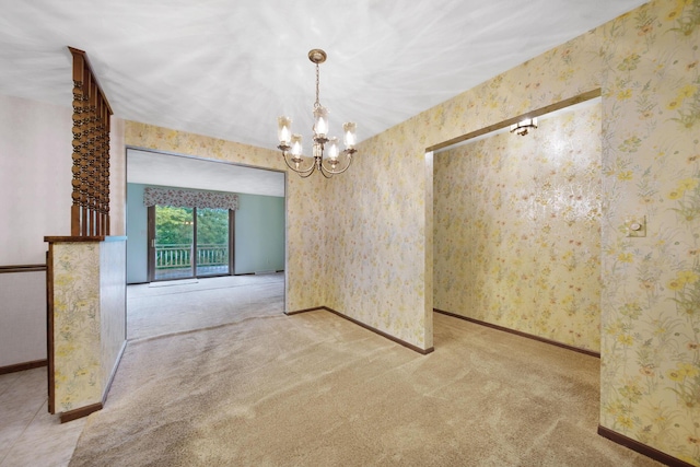 2580 Applewood Ln NE, Lancaster, OH 43130 - carpeted empty room with a chandelier, baseboards, and wallpapered walls