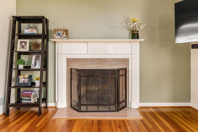 2008 N Edgemont Rd, Upper Arlington, OH 43212 - detailed view of a fireplace, wood finished floors, and baseboards