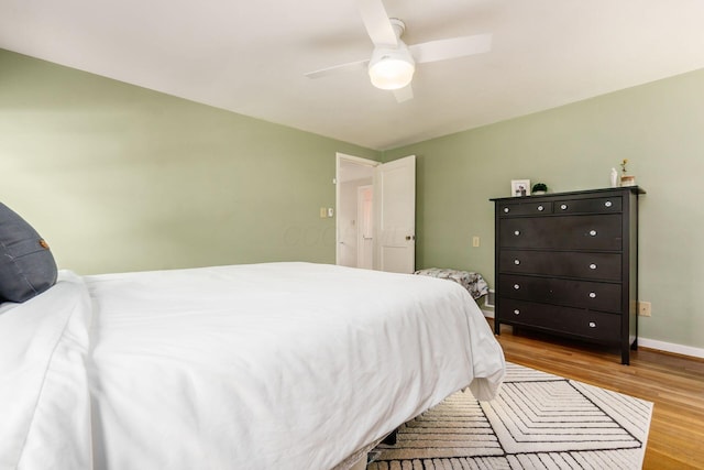 2008 N Edgemont Rd, Upper Arlington, OH 43212 - bedroom featuring wood finished floors, ceiling fan, and baseboards