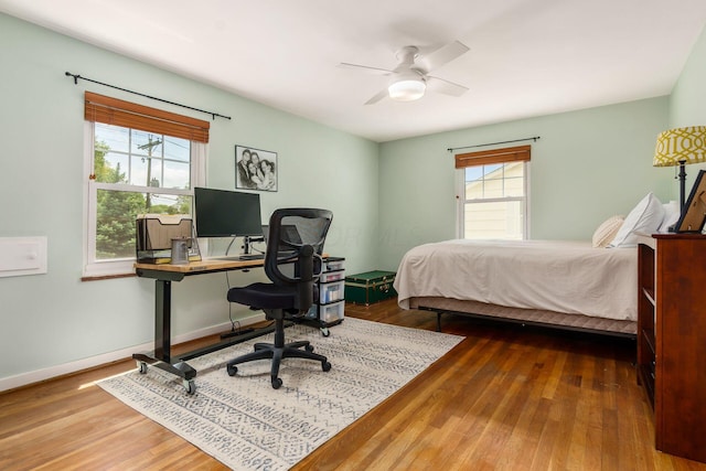 2008 N Edgemont Rd, Upper Arlington, OH 43212 - bedroom with an office area, wood finished floors, and ceiling fan