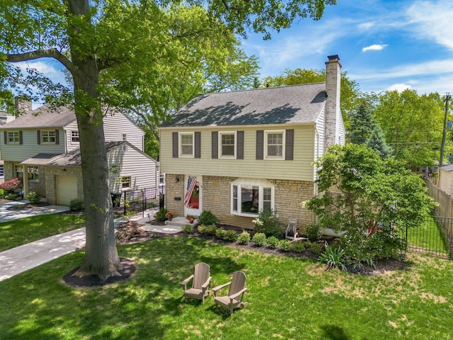 2008 N Edgemont Rd, Upper Arlington, OH 43212 - colonial house featuring brick siding and a chimney