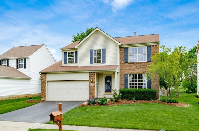 6249 Corley Dr, Dublin, OH 43016 - traditional-style home featuring driveway, brick siding, and a front yard