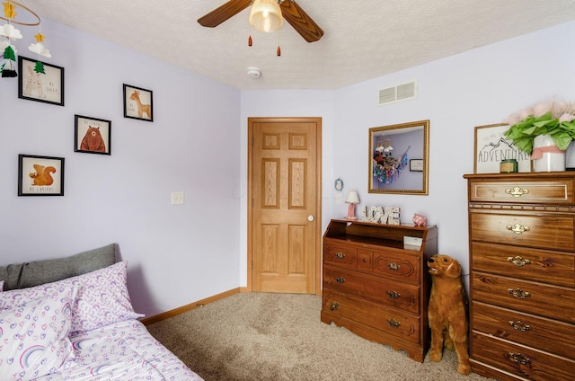 6249 Corley Dr, Dublin, OH 43016 - bedroom with carpet, a textured ceiling, ceiling fan, and baseboards