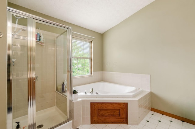 6249 Corley Dr, Dublin, OH 43016 - full bathroom featuring a garden tub, a stall shower, tile patterned floors, and a textured ceiling