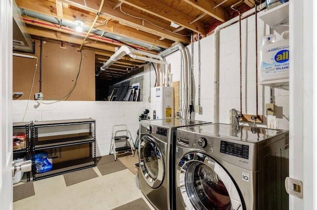 6249 Corley Dr, Dublin, OH 43016 - laundry area with independent washer and dryer, concrete block wall, and water heater