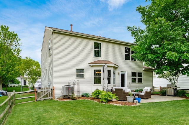 6249 Corley Dr, Dublin, OH 43016 - rear view of house featuring cooling unit, a patio area, outdoor lounge area, and a gate