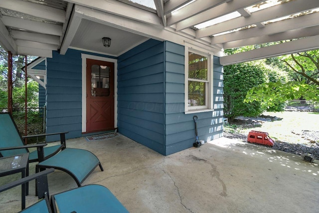 297 S James Rd, Columbus, OH 43213 - property entrance featuring a patio area and a pergola