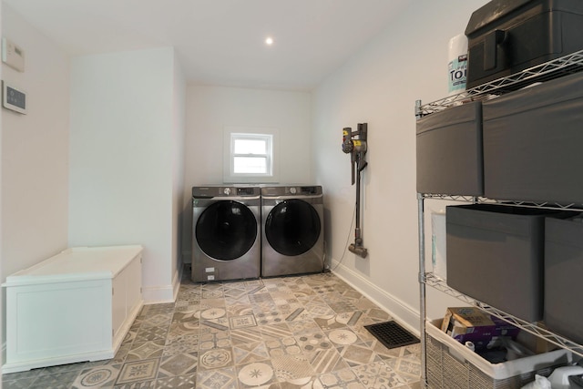 432 E Kossuth St, Columbus, OH 43206 - washroom with separate washer and dryer, baseboards, recessed lighting, and light tile patterned flooring