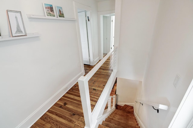 432 E Kossuth St, Columbus, OH 43206 - staircase featuring wood finished floors and baseboards