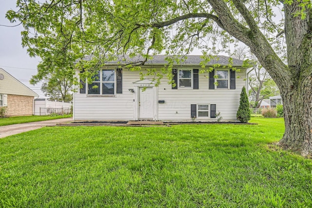 4736 Arnold Ave, Columbus, OH 43228 - bi-level home with a front lawn