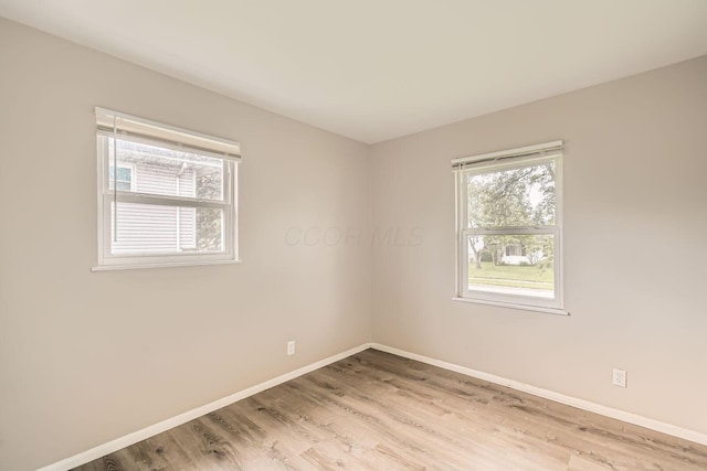 4736 Arnold Ave, Columbus, OH 43228 - unfurnished room featuring baseboards and light wood-style flooring