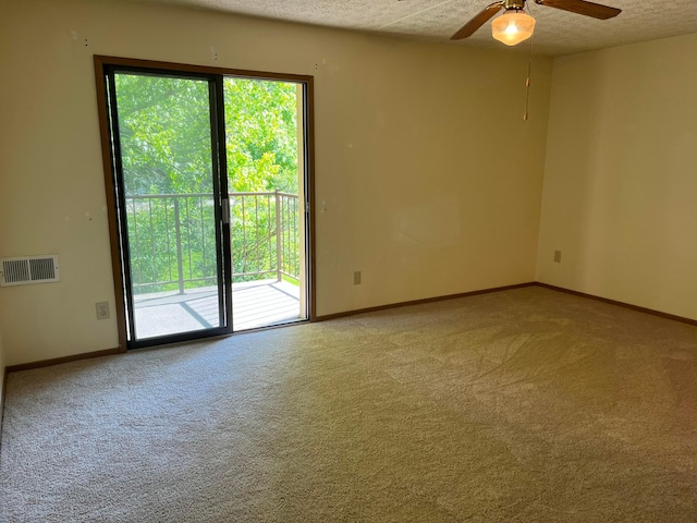 3965 Karl Rd Unit 200, Columbus, OH 43224 - spare room featuring carpet, ceiling fan, baseboards, and a textured ceiling