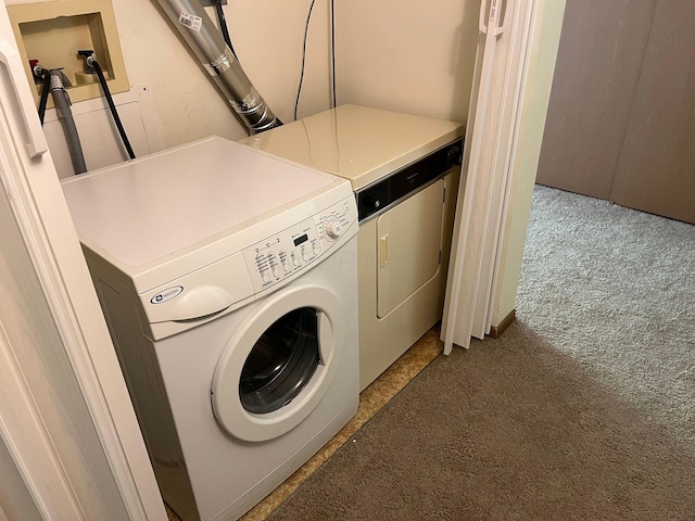 3965 Karl Rd Unit 200, Columbus, OH 43224 - washroom featuring washer and clothes dryer and carpet