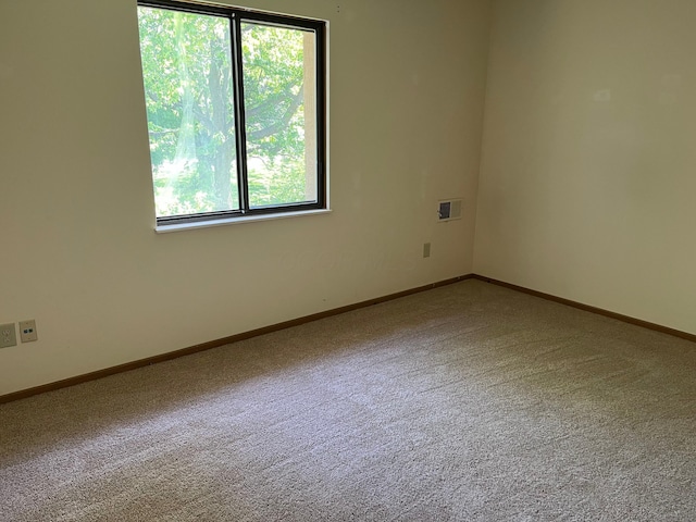 3965 Karl Rd Unit 200, Columbus, OH 43224 - carpeted spare room with healthy amount of natural light and baseboards