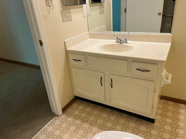 3965 Karl Rd Unit 200, Columbus, OH 43224 - bathroom with vanity and baseboards