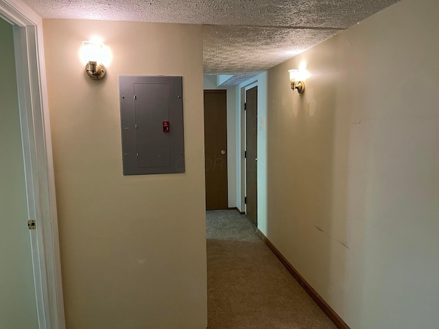 3965 Karl Rd Unit 200, Columbus, OH 43224 - corridor with electric panel, a textured ceiling, and carpet