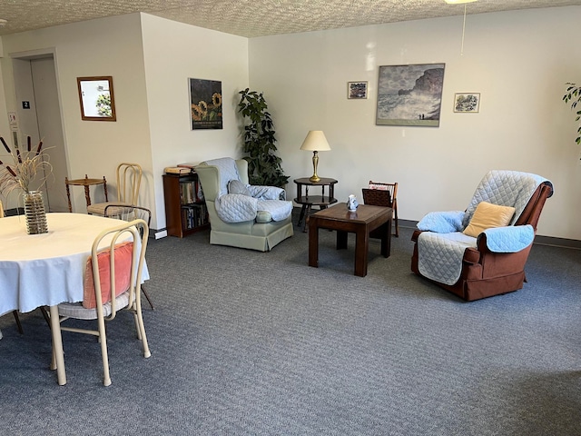 3965 Karl Rd Unit 200, Columbus, OH 43224 - dining area with carpet flooring, a textured ceiling, and baseboards