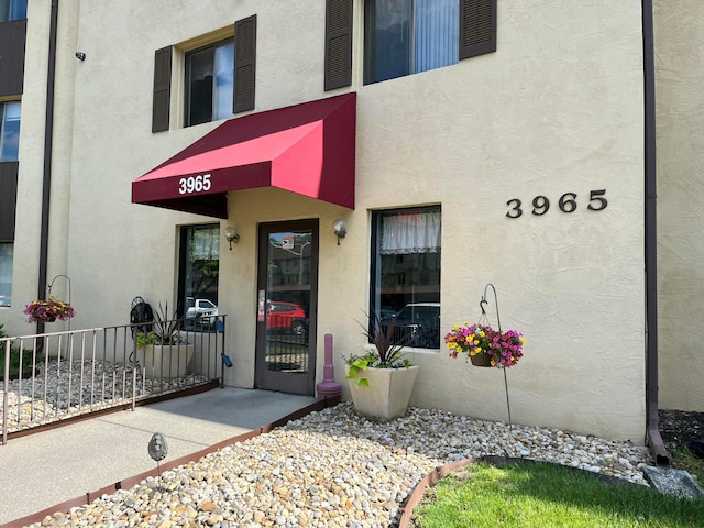 3965 Karl Rd Unit 200, Columbus, OH 43224 - entrance to property featuring stucco siding