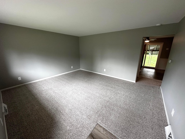 239 Maplewood Ave, Columbus, OH 43213 - carpeted spare room with baseboards, a ceiling fan, and a smoke detector