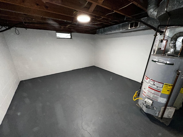 239 Maplewood Ave, Columbus, OH 43213 - unfinished basement featuring gas water heater and concrete block wall