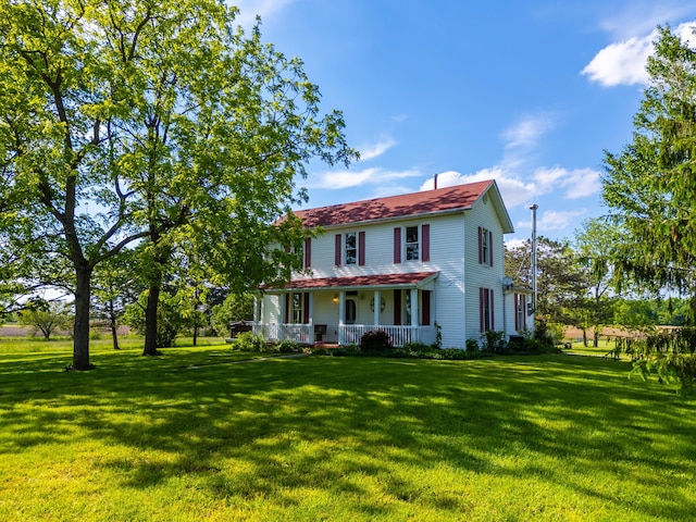 4842 State Route 734, Jeffersonville, OH 43128 - view of front of house with covered porch and a front yard
