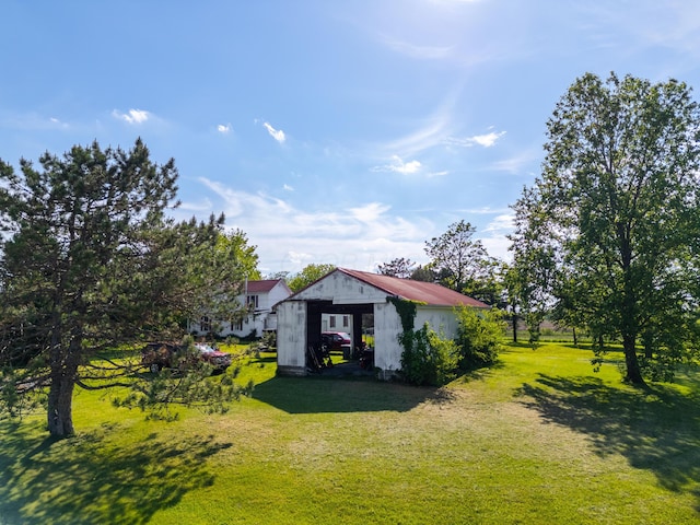 4842 State Route 734, Jeffersonville, OH 43128 - view of grassy yard featuring an outdoor structure