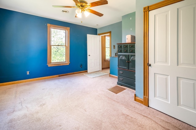 4842 State Route 734, Jeffersonville, OH 43128 - unfurnished bedroom featuring carpet flooring, baseboards, and a ceiling fan