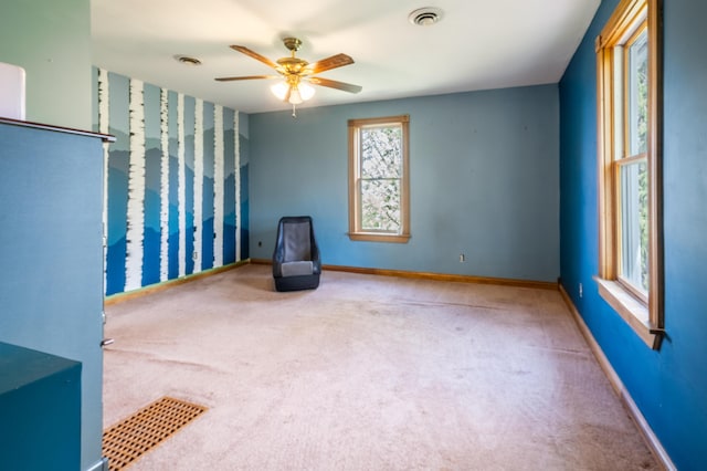 4842 State Route 734, Jeffersonville, OH 43128 - spare room with carpet flooring, ceiling fan, and baseboards