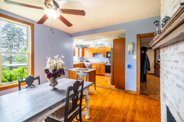 4842 State Route 734, Jeffersonville, OH 43128 - dining area featuring track lighting, light wood-style floors, and ceiling fan