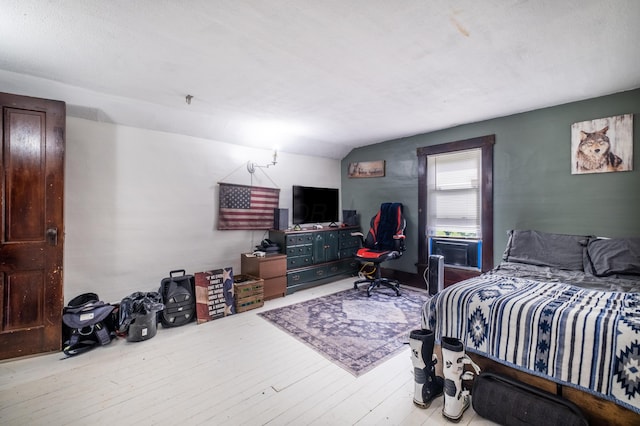 4842 State Route 734, Jeffersonville, OH 43128 - bedroom featuring wood finished floors and lofted ceiling